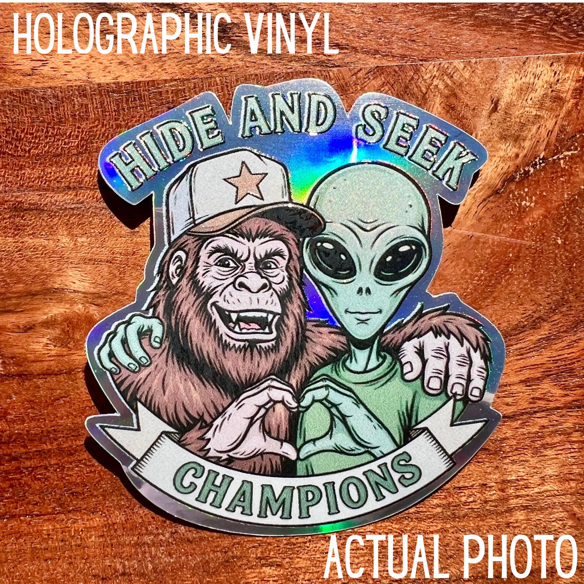 Hide and Seek Champions Sticker: Aliens and Big Foot Joke Decal