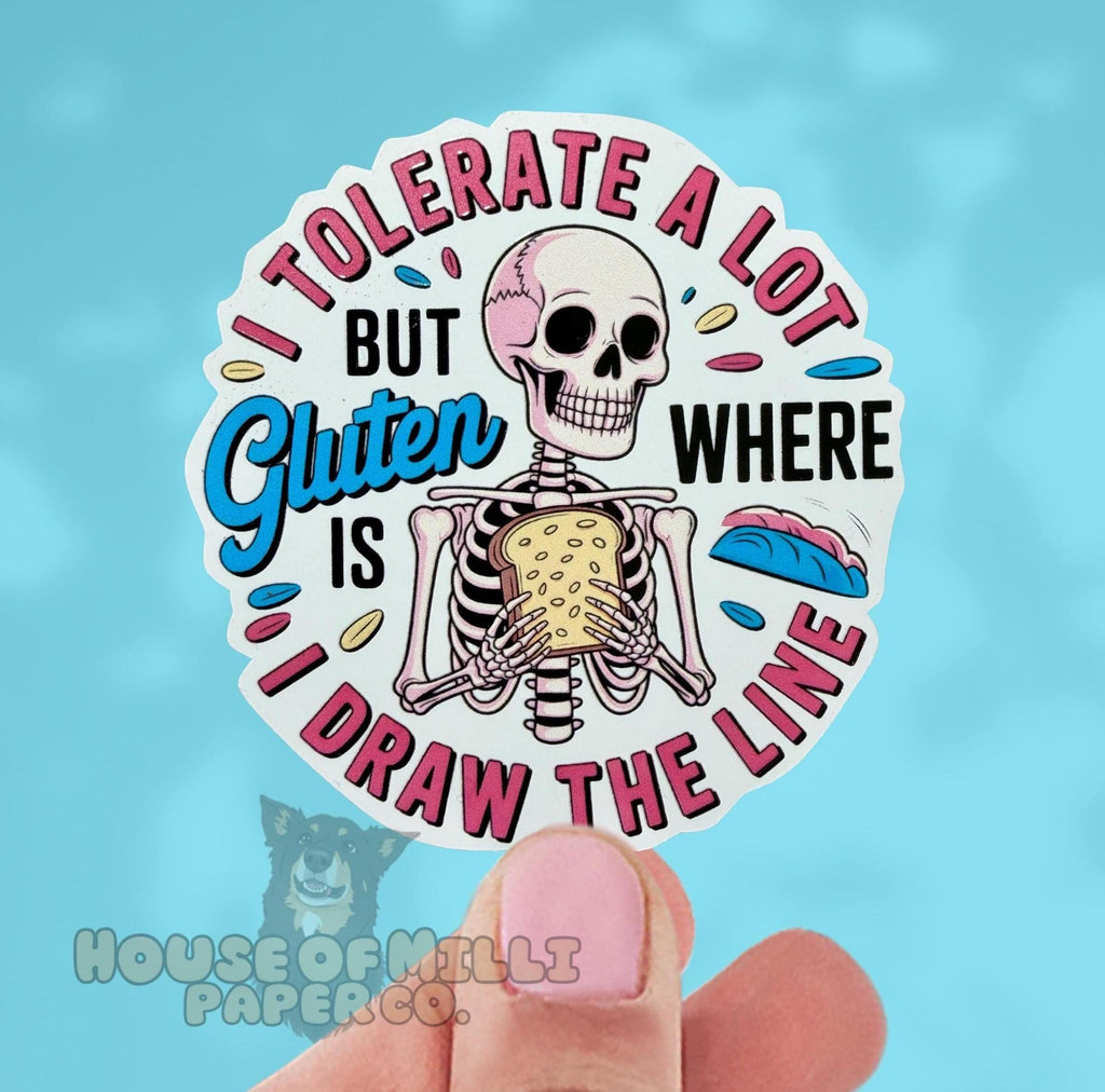 Sticker with skeleton holding bread and text 'I tolerate a lot but gluten is where I draw the line' on a blue background.