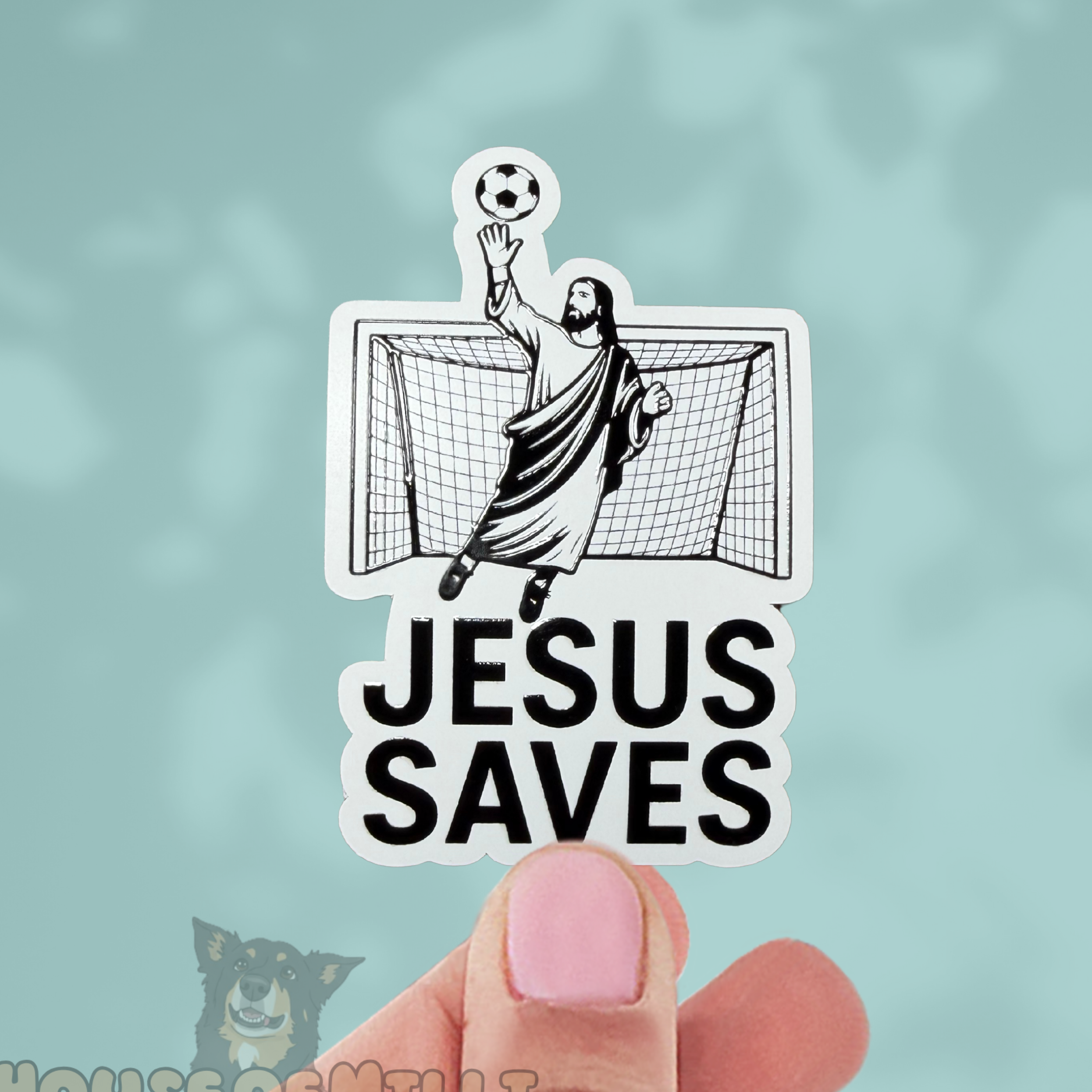 Sticker with 'Jesus Saves' design held by a hand against a light blue background.