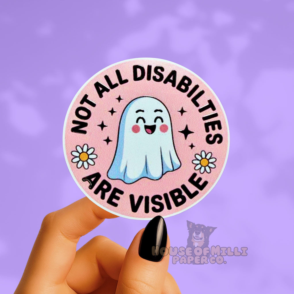 Sticker with a ghost illustration and text 'Not All Disabilities Are Visible' held by a hand on a purple background.