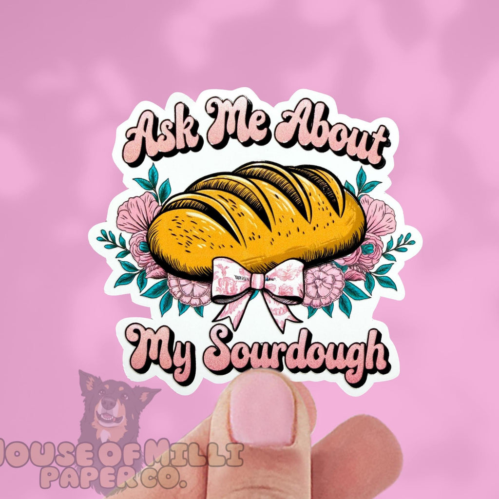 Sticker with a loaf of bread and flowers on a pink background, featuring text 'Ask Me About My Sourdough'.