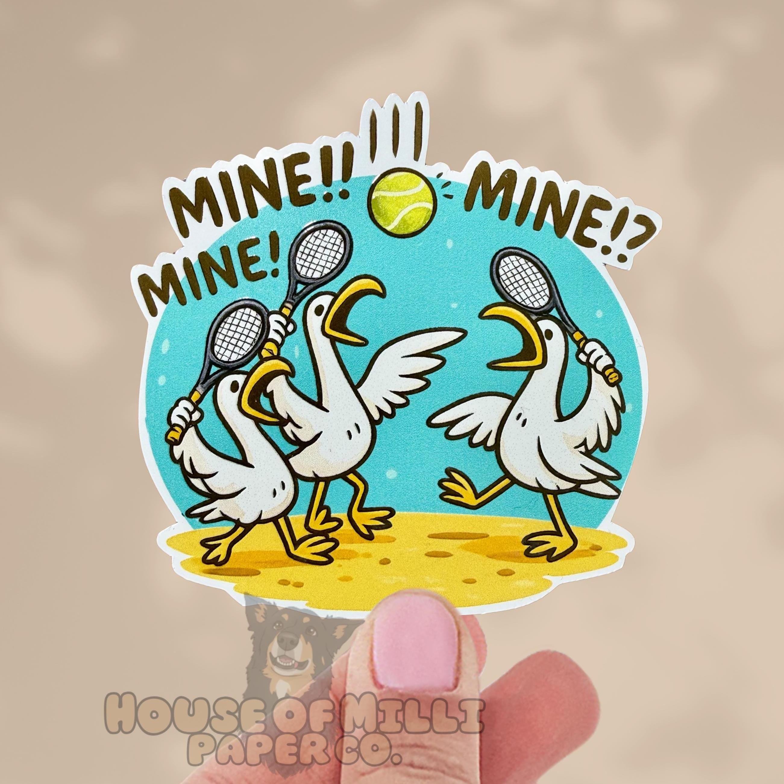 Cartoon sticker with three ducks holding tennis rackets and a ball, with text 'MINE!!' on a beige background.